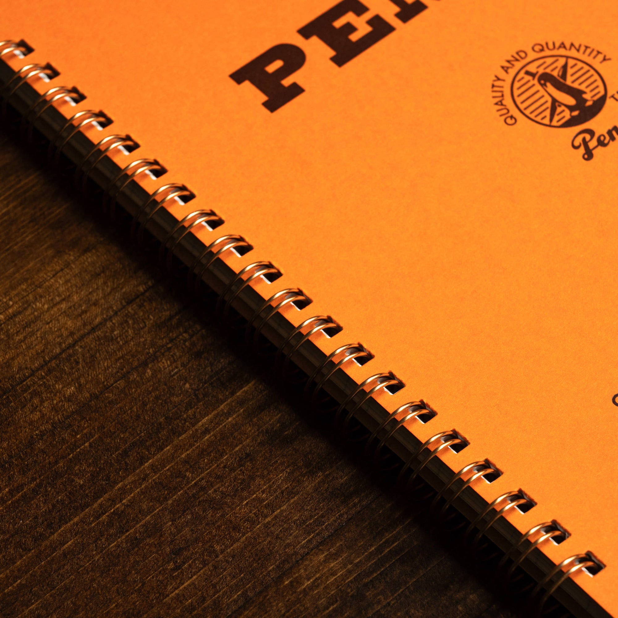 Penco Large Orange Coil Notebook front cover & coil close up 