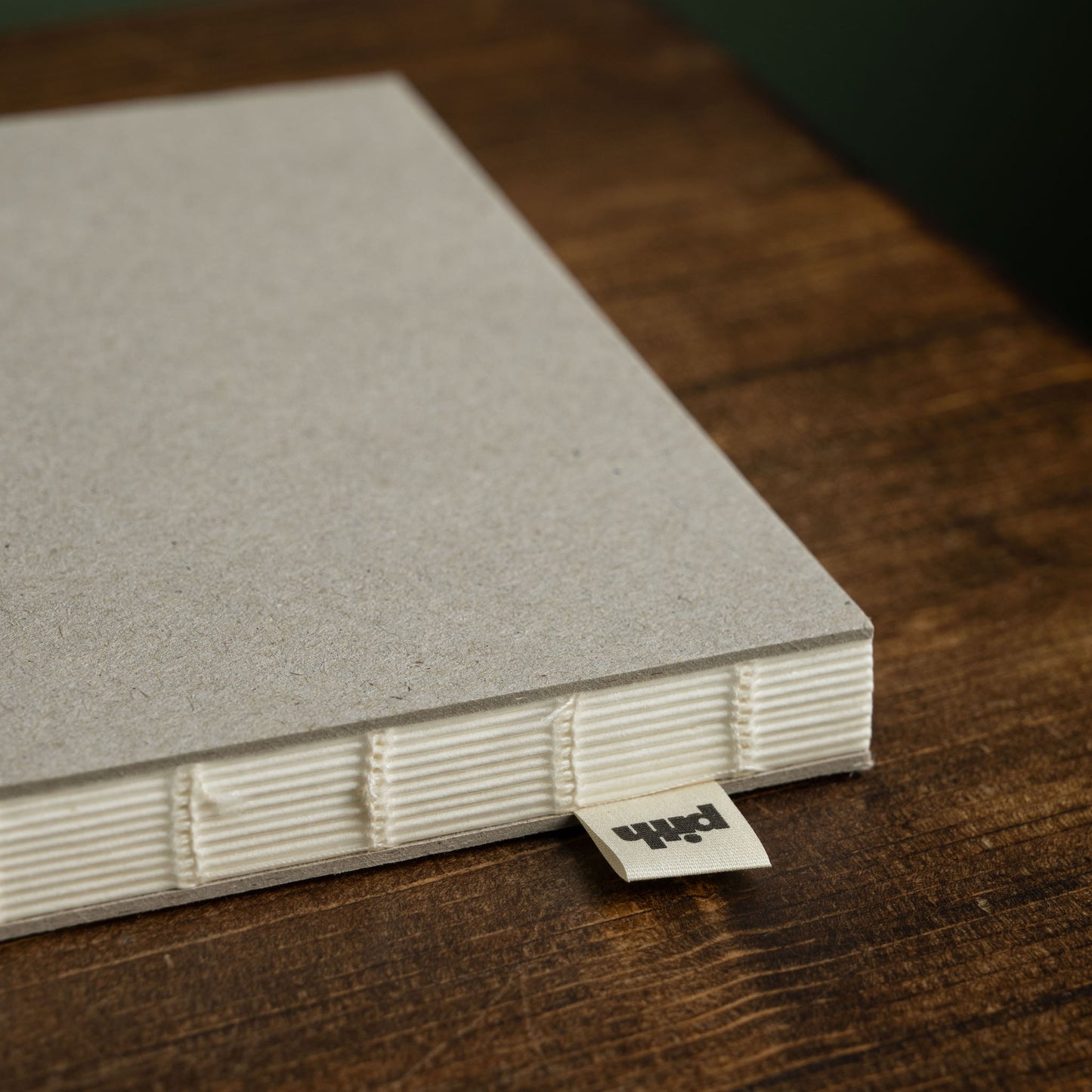 Pith Cara Cara flat lay binding and cotton logo label