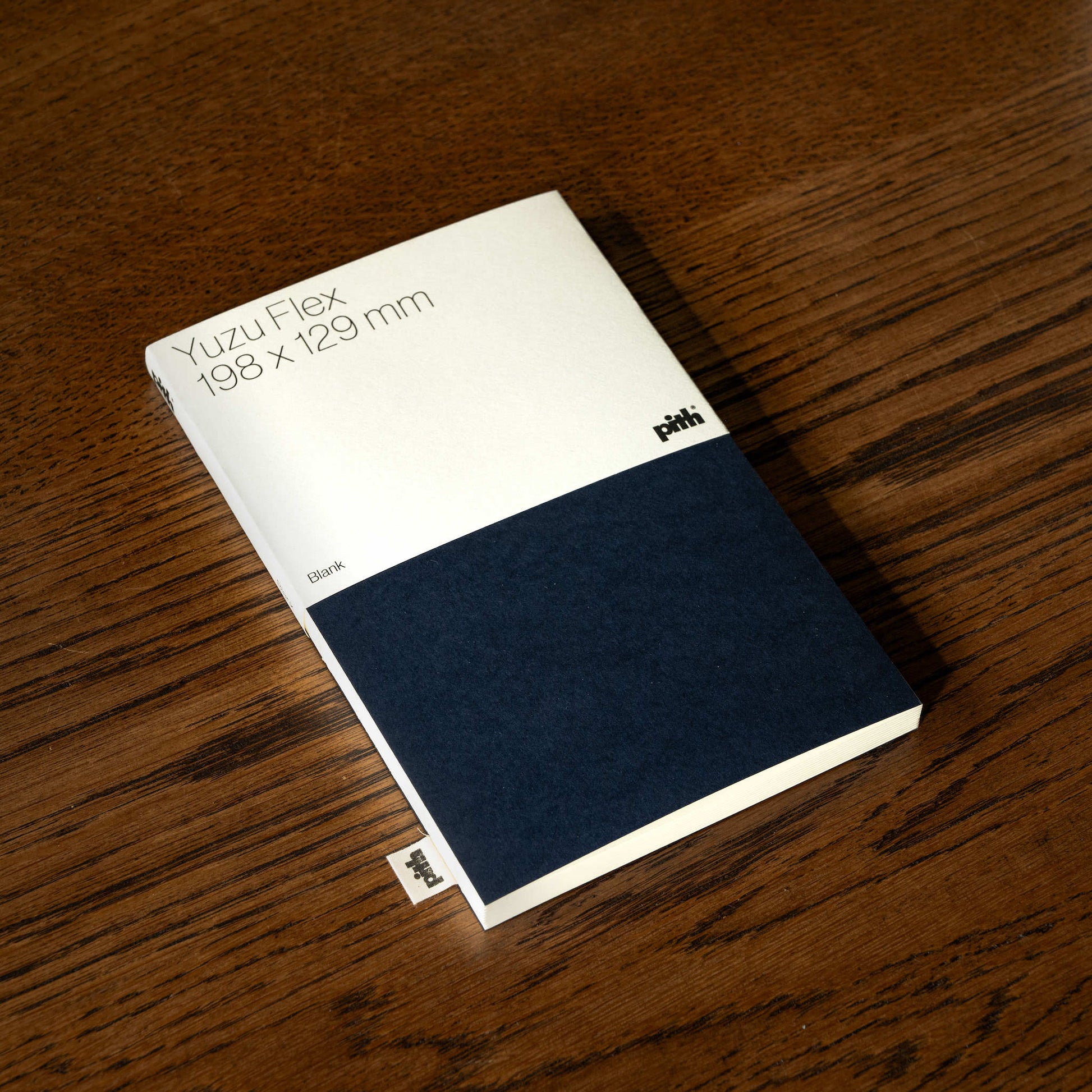Pith Supply Blue Yuzu Flex Notebook with blank paper.
