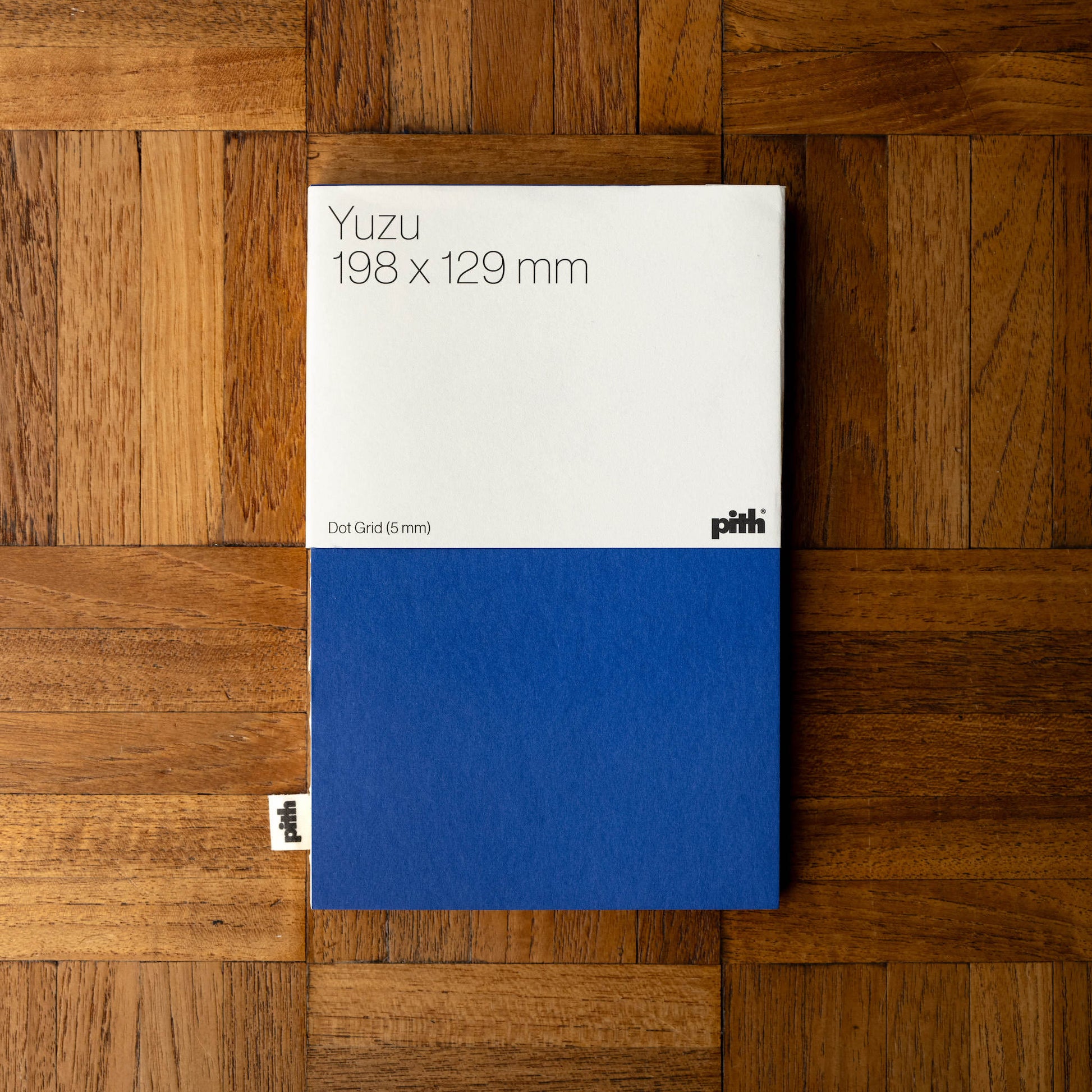 Pith Yuzu Notebook in blue with dot grid paper layout