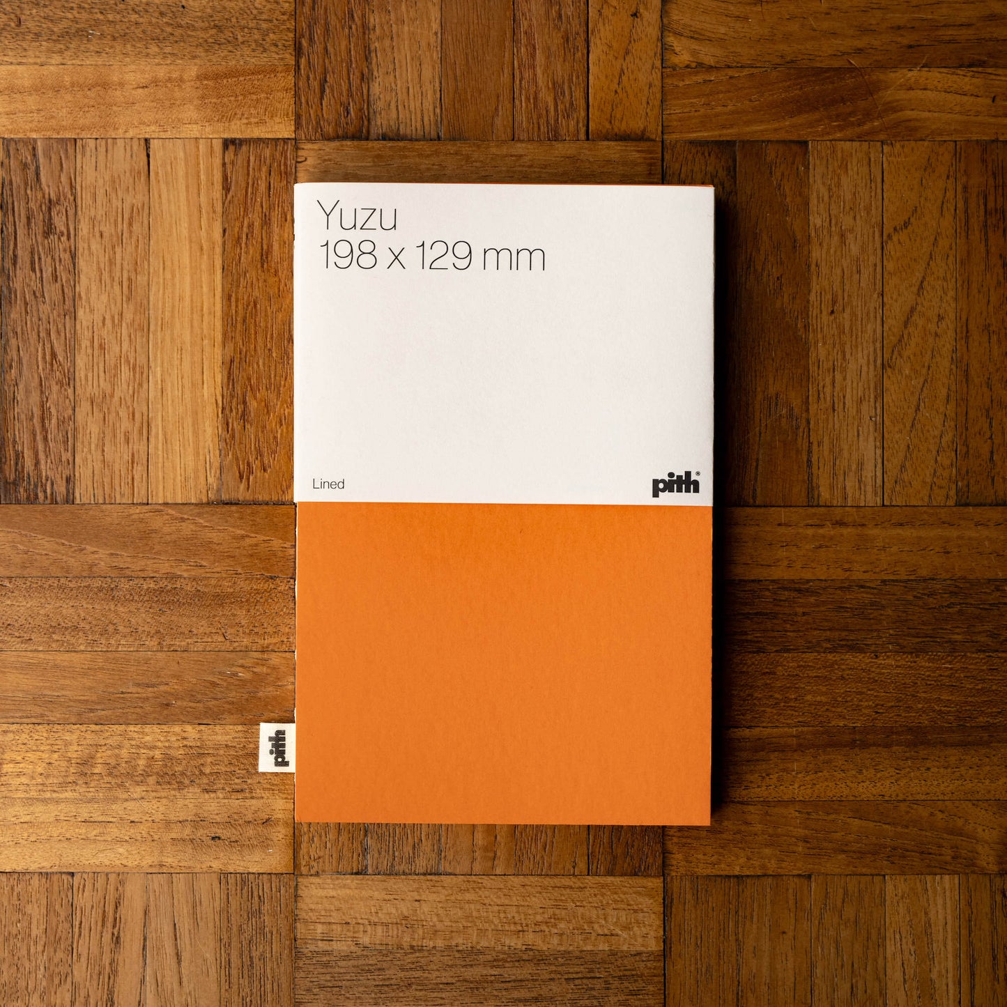 Pith Yuzu Notebook in orange with lined paper