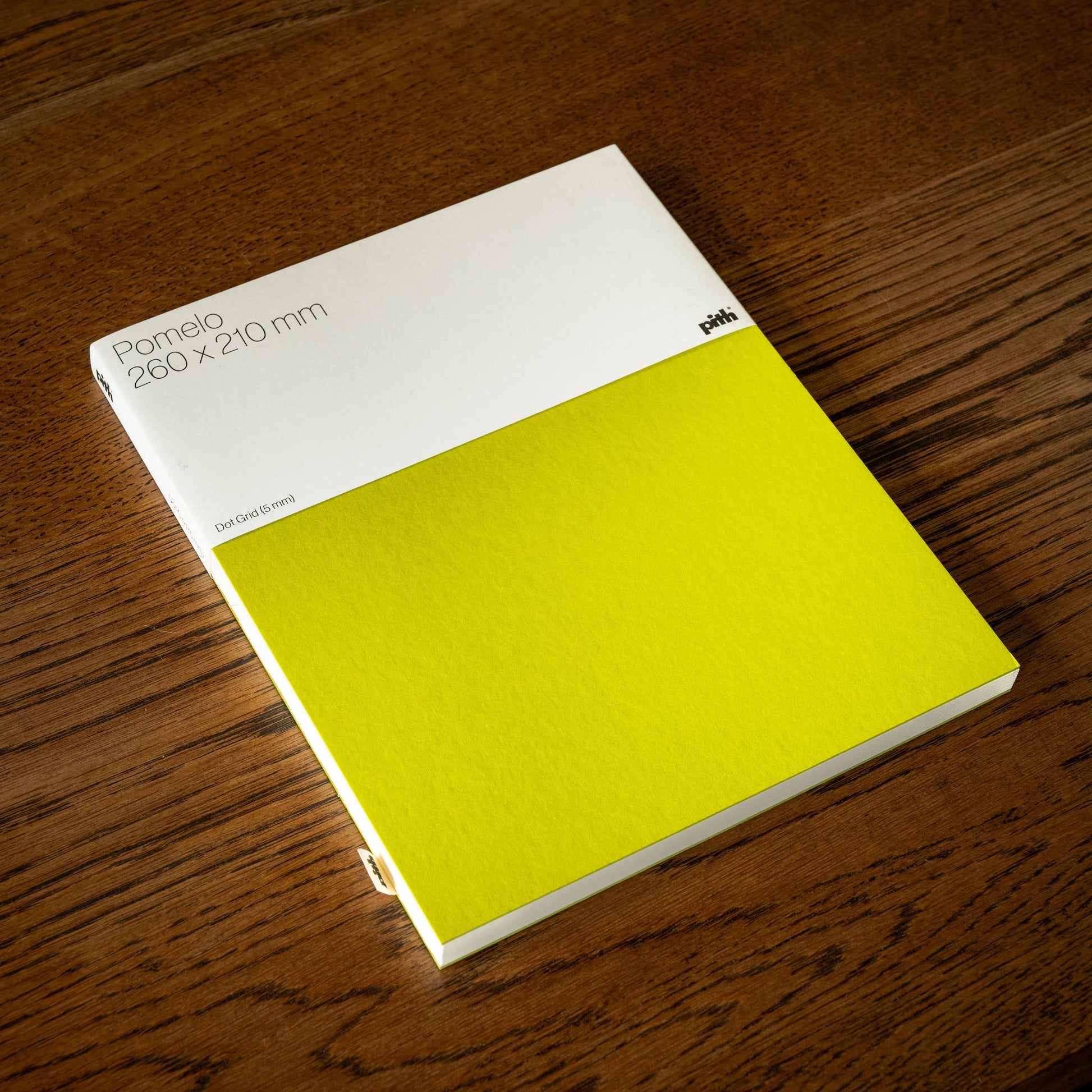 Pith Supply Pomelo Notebook in Chartreuse with dot grid paper.