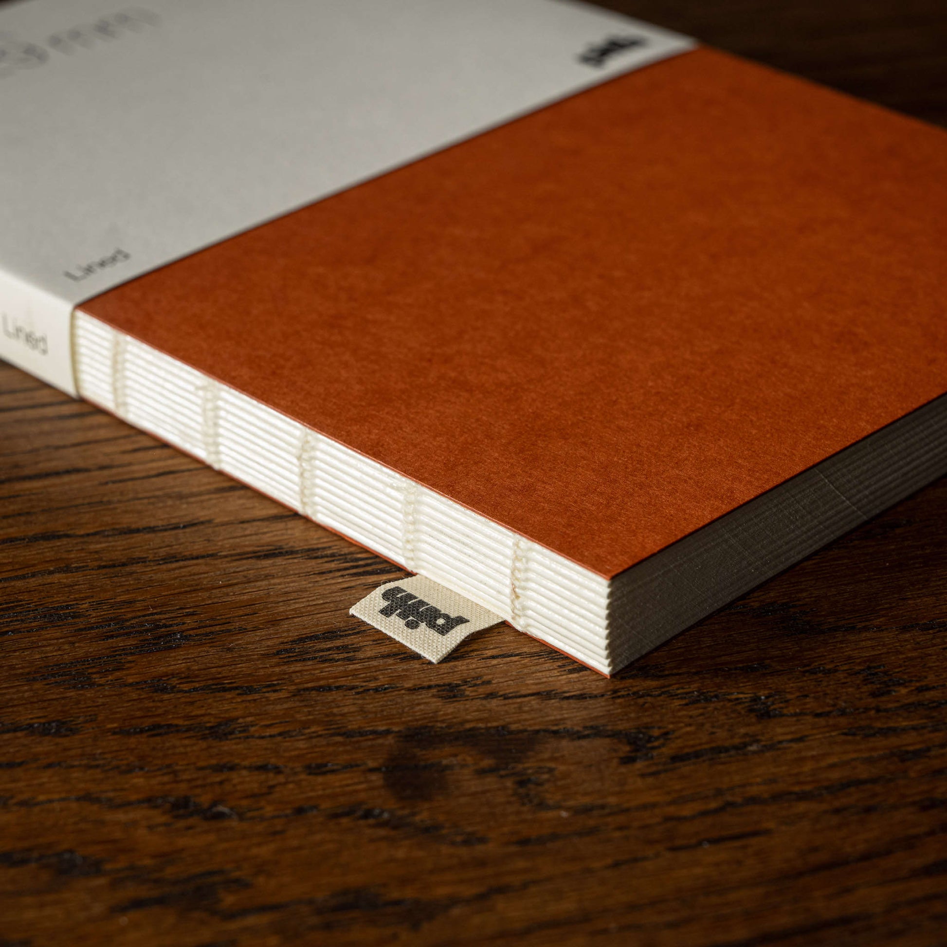 Pith Supply Yuzu Flex Notebook woven label & flat lay binding.