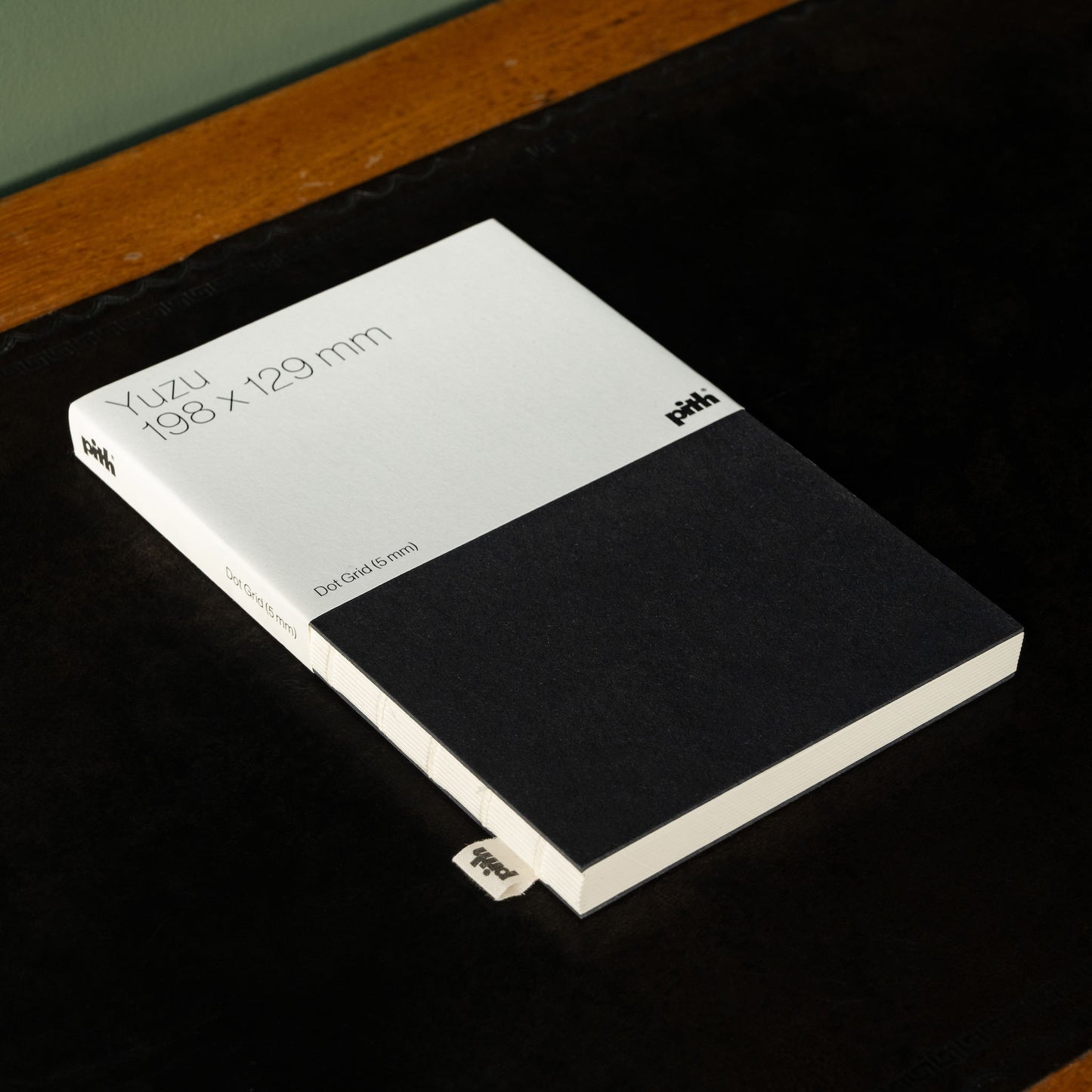 Pith Yuzu Notebook with black cover and dot grid paper