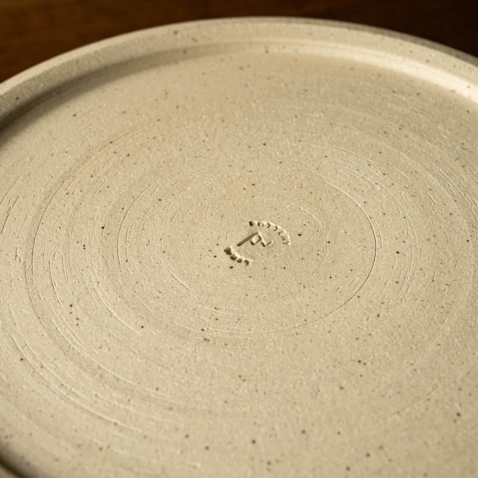 Pottery West Stoneware Serving Bowl base with makers mark.
