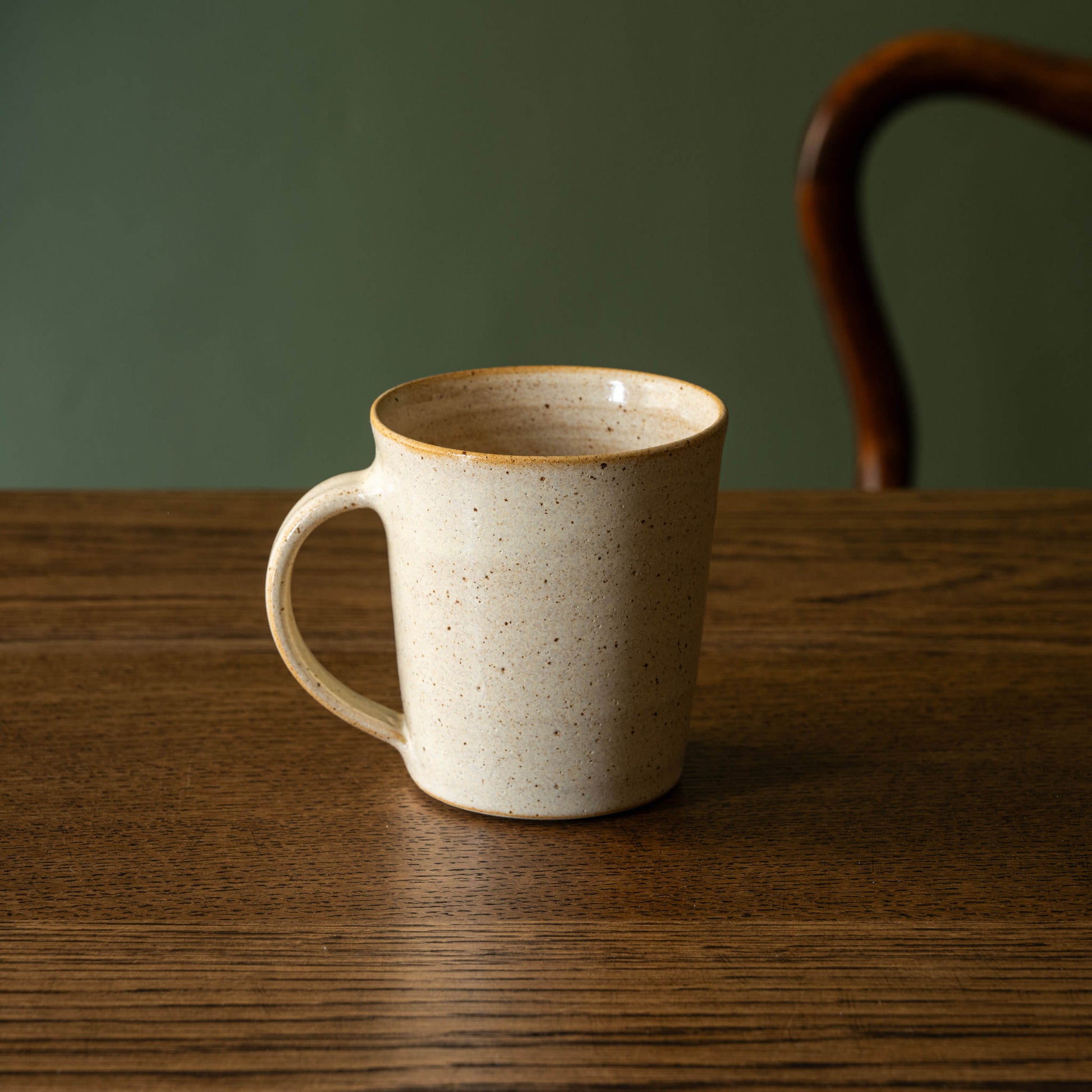 Pottery West Stoneware Tapered Mug in Sand Glaze. 