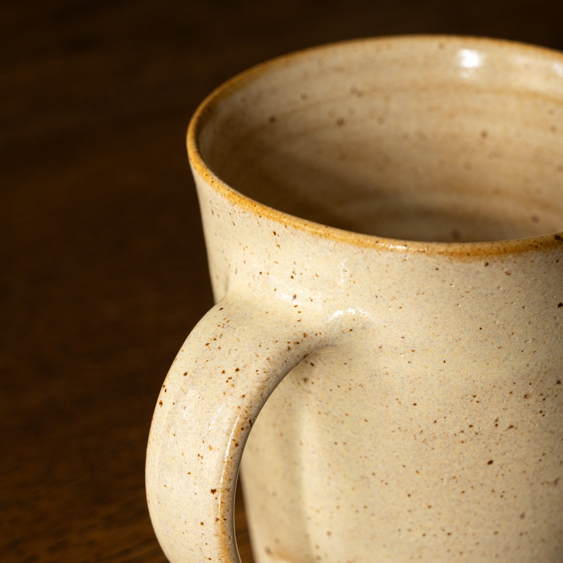 Pottery West Stoneware Tapered Mug handle in sand glaze. 