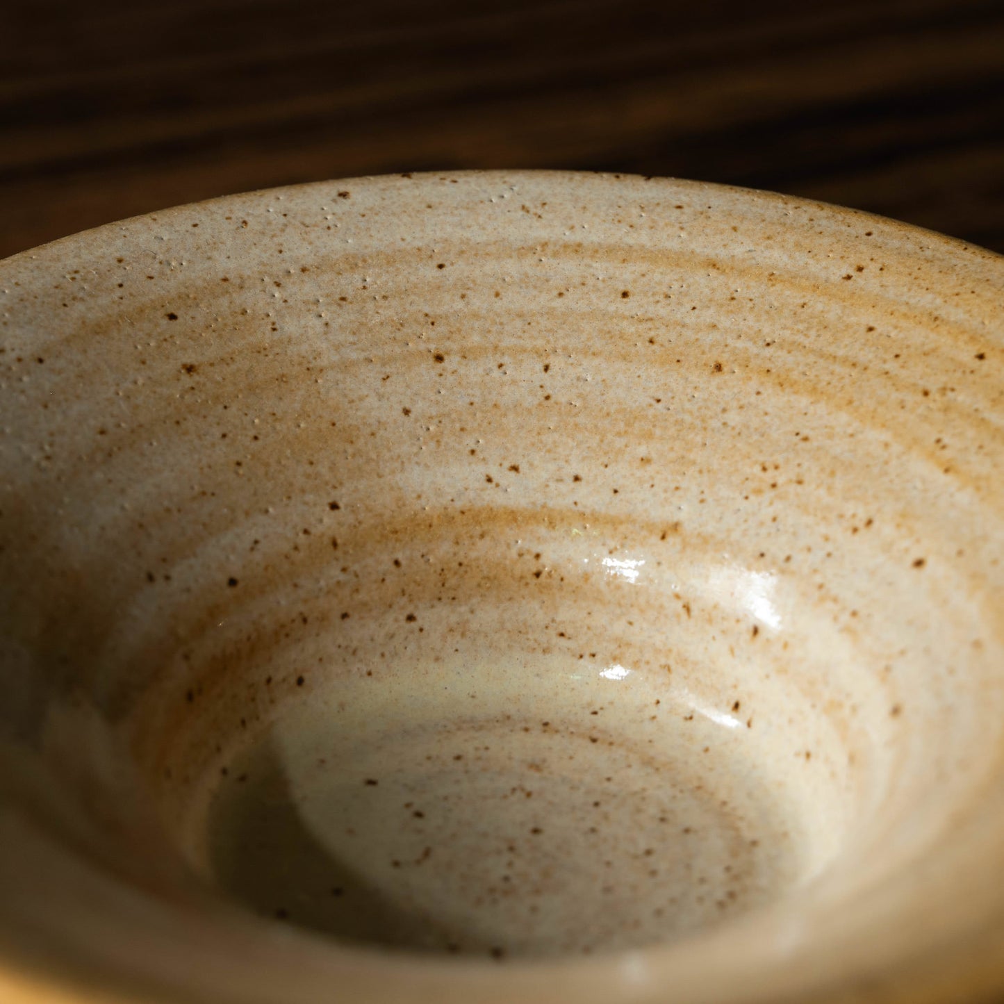 Glaze detail of the Pottery West candle holder in sand flecked stoneware 
