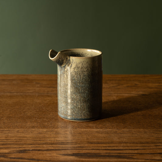 Pottery West stoneware pourer in nori glaze.