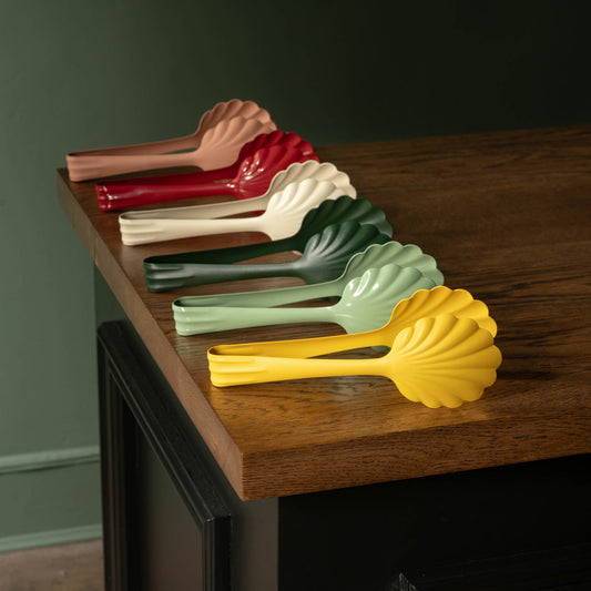 Roger Orfevre stainless steel bakery tongs in assorted colours.