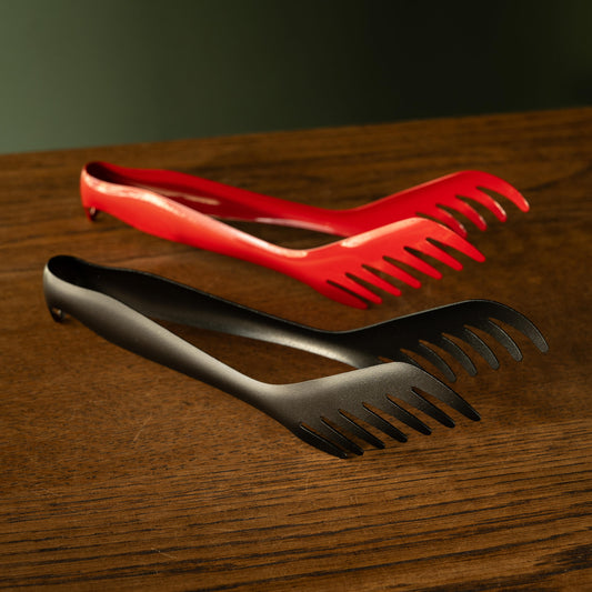 Stainless steel serving tongs in red & black.