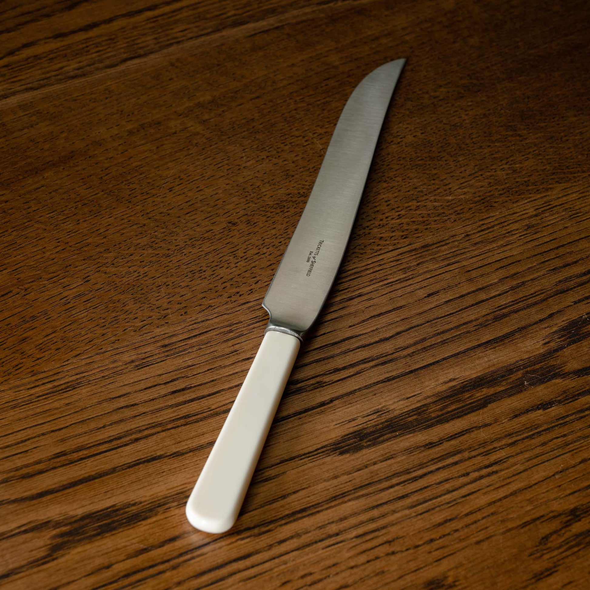 Tricketts of Sheffield Carving knife with Sheffield steel blade & cream handle
