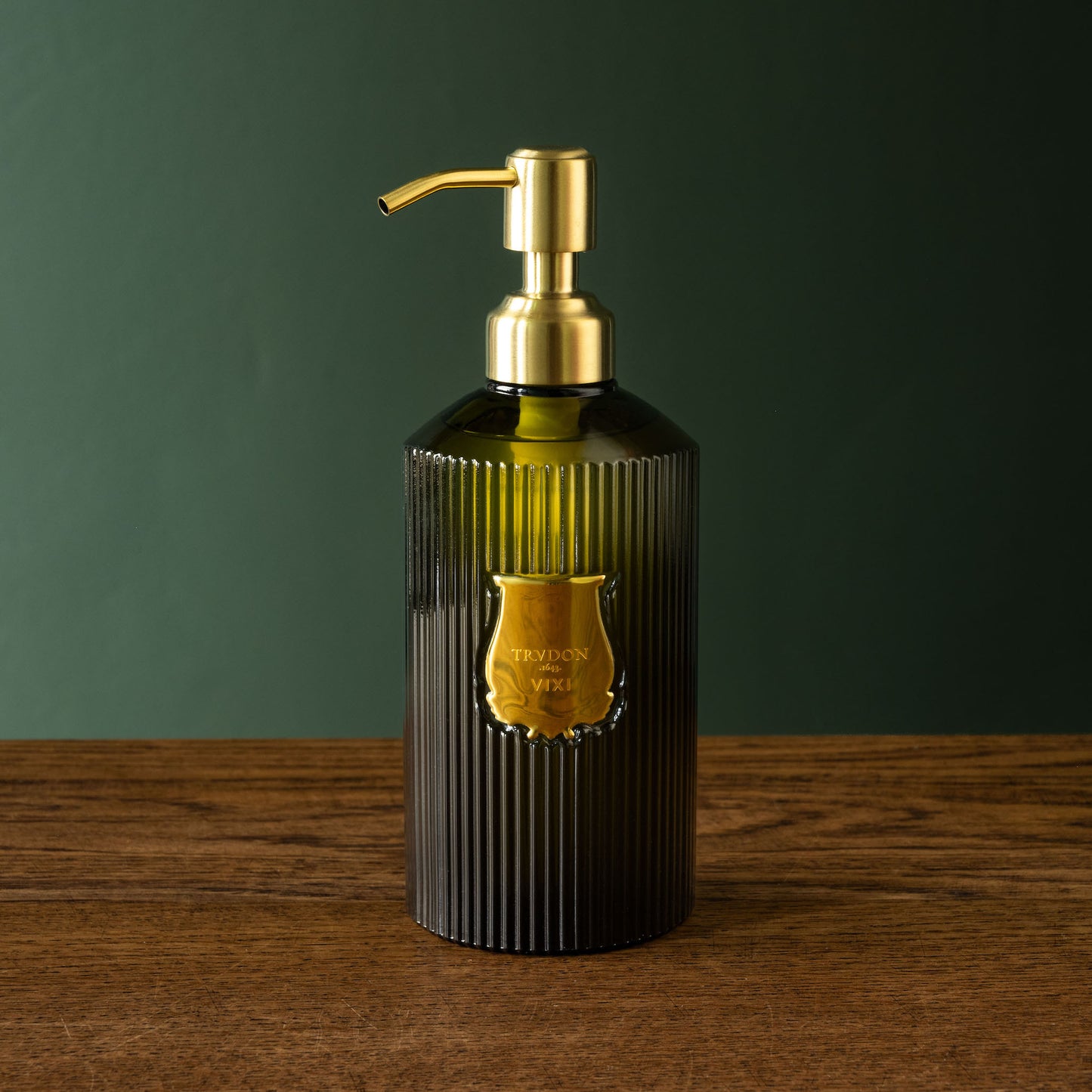 Trudon dark green glass soap dispenser with gold pump 