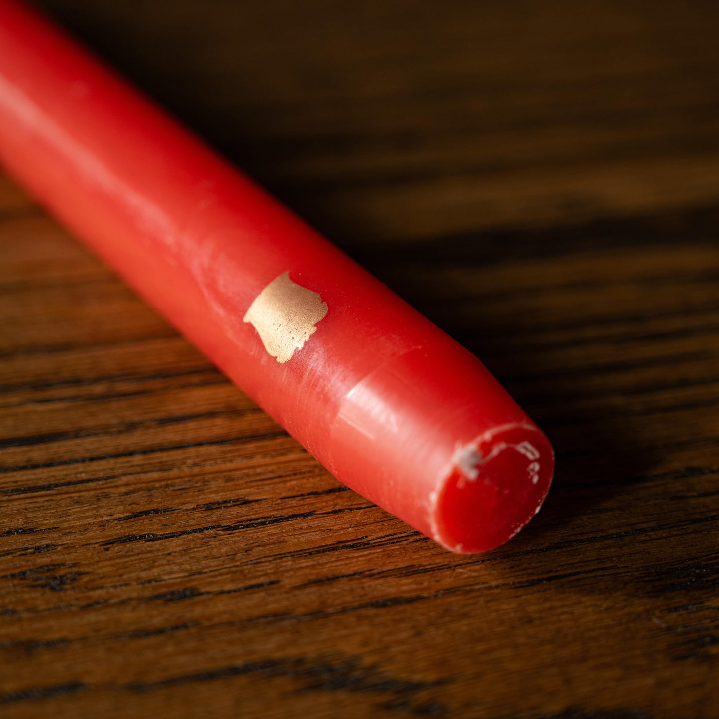 Close-up of Trudon Madeleine brick taper candle base 