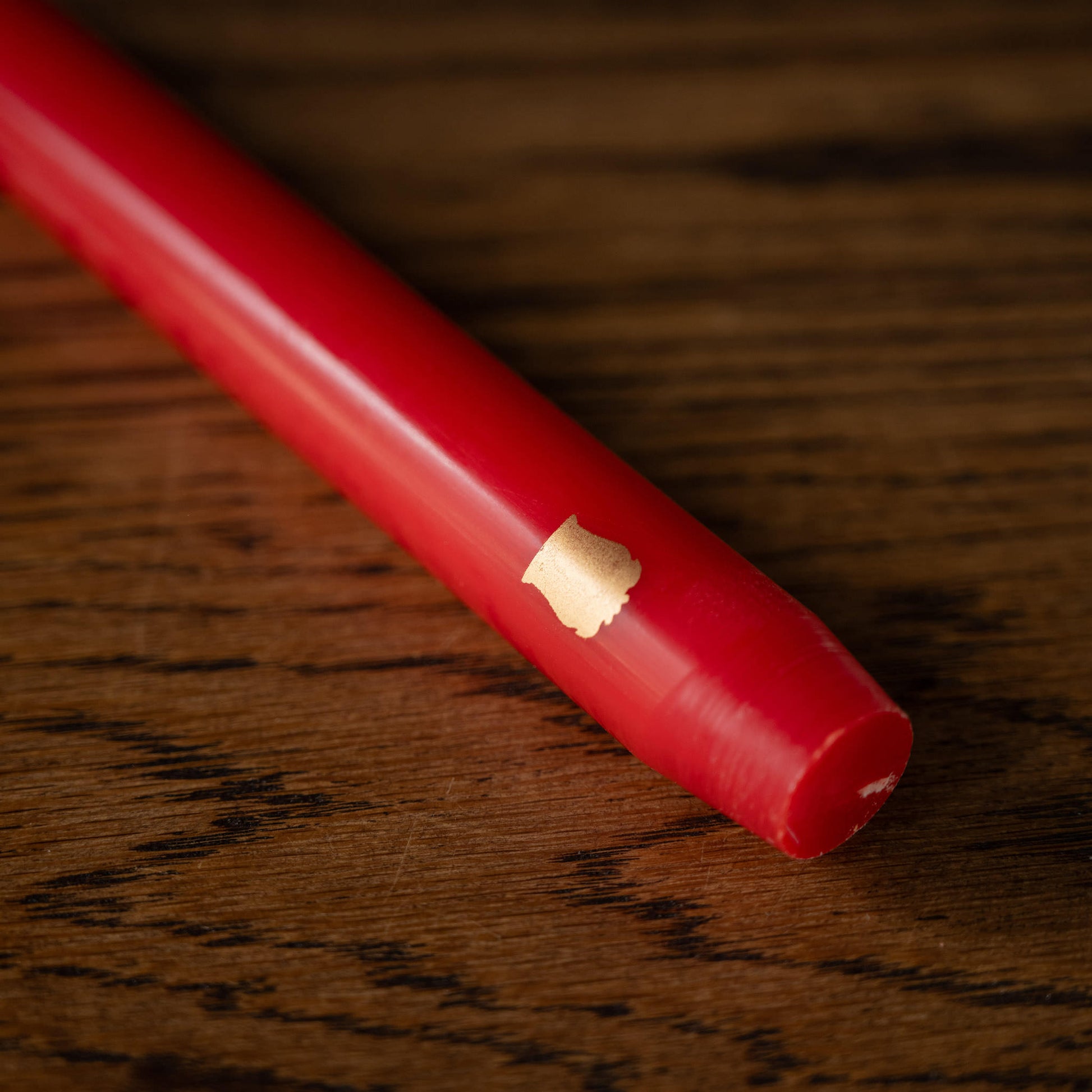 Trudon red taper candle 