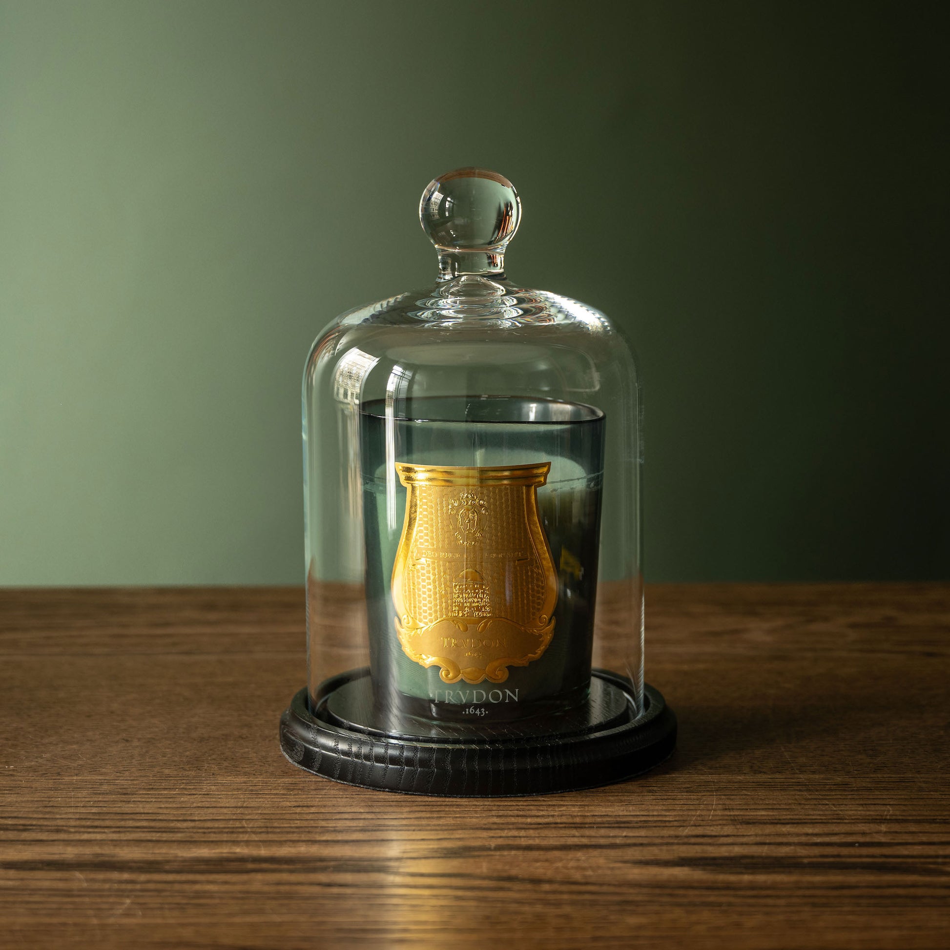 Trudon La cloche bell jar with a standard sized Trudon candle inside.