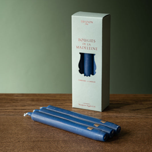 Trudon box of six Madeleine Taper candles in Bleu Marine. 