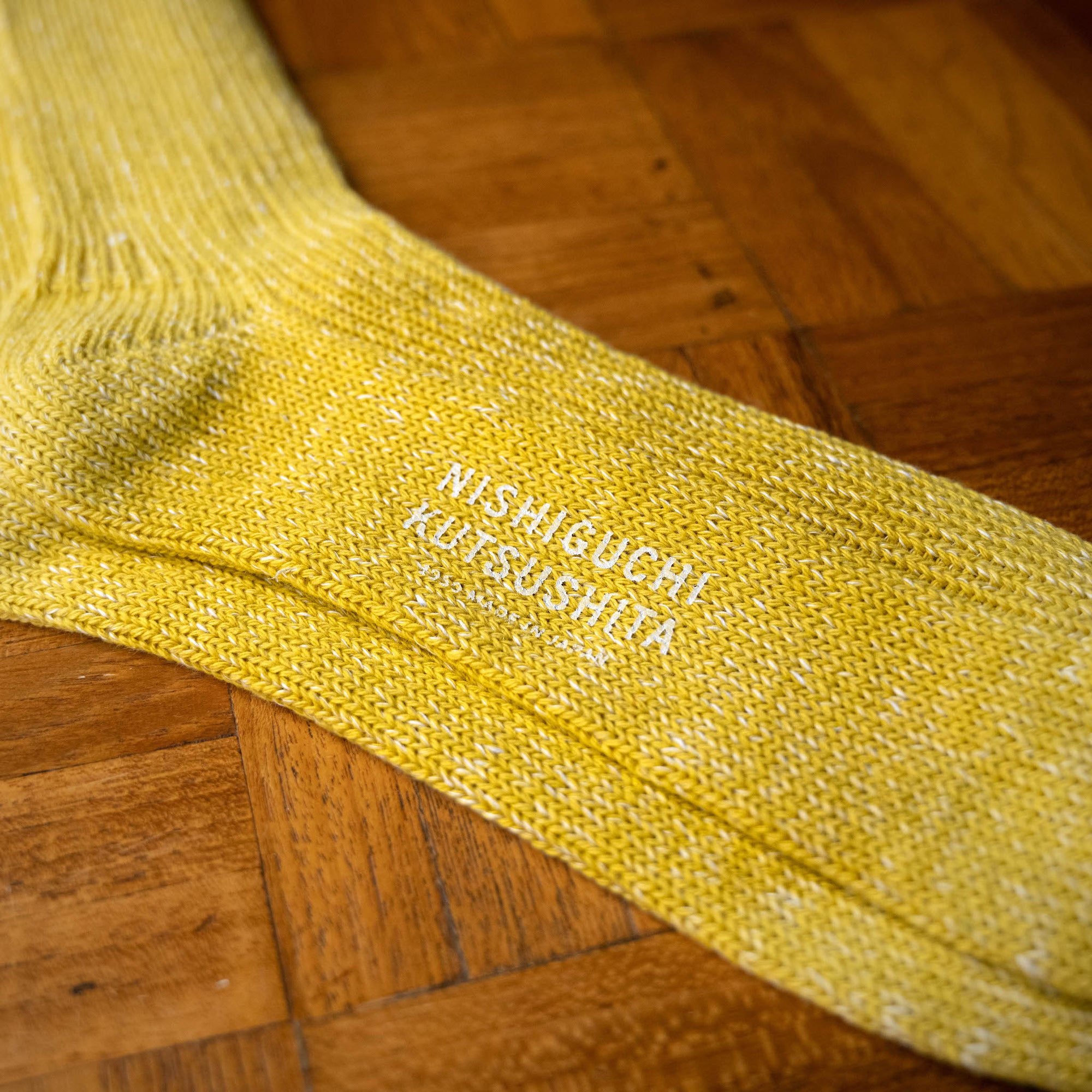 Nishiguchi Kutsushita Yellow Hemp & Cotton Socks Branding